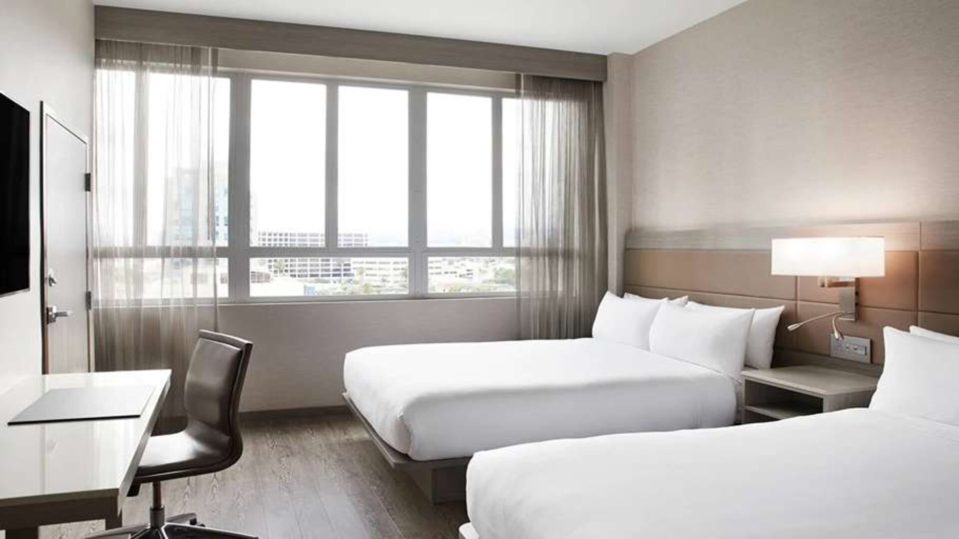 Twin room with desk at AC Hotel By Marriott Beverly Hills.