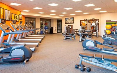Fitness center with treadmills at Residence Inn By Marriott LAX Airport.