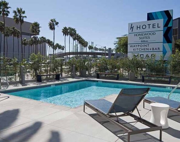 Refreshing outdoor pool at H Hotel Los Angeles, Curio Collection By Hilton.
