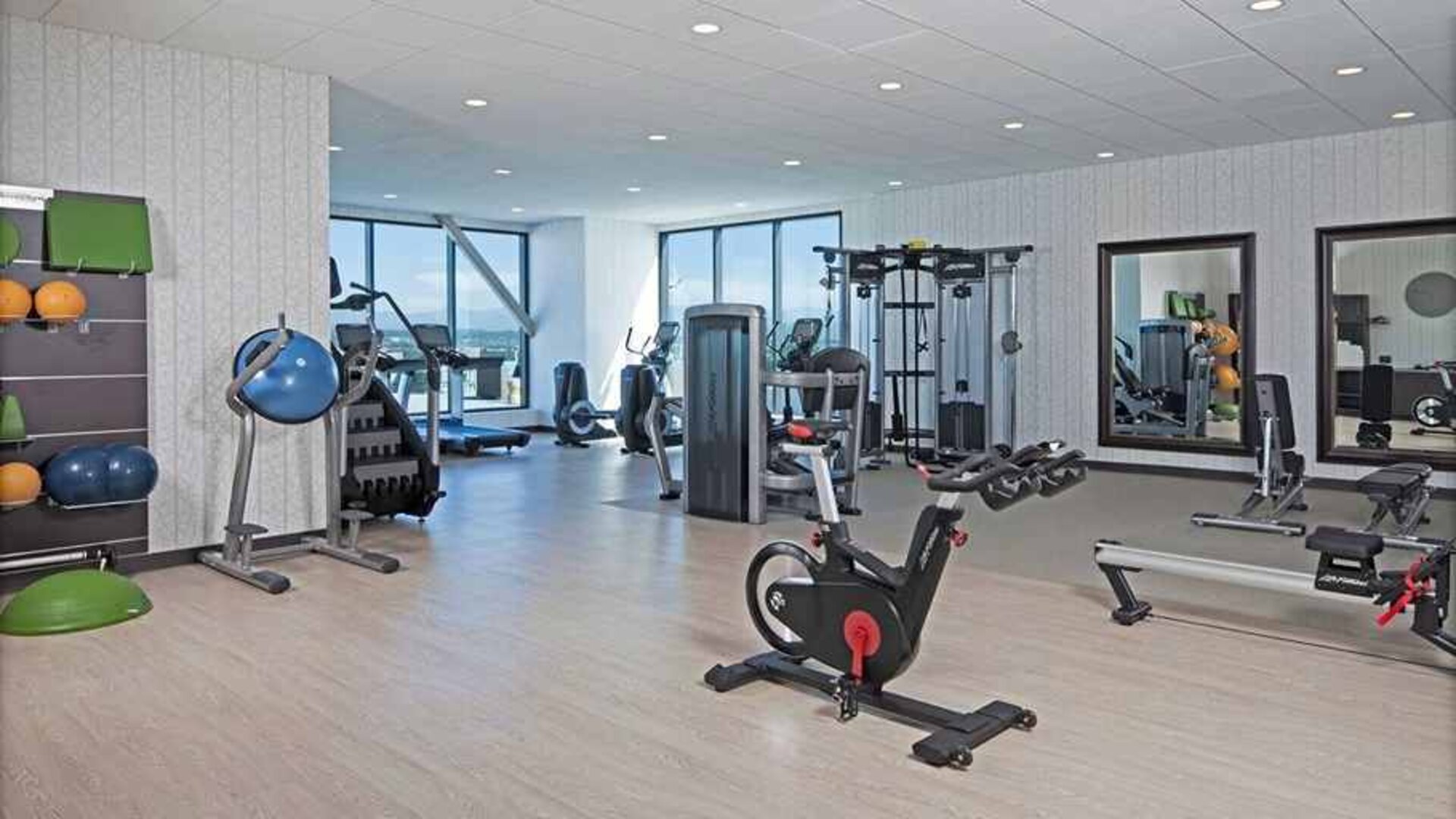 Fitness center available at H Hotel Los Angeles, Curio Collection By Hilton.
