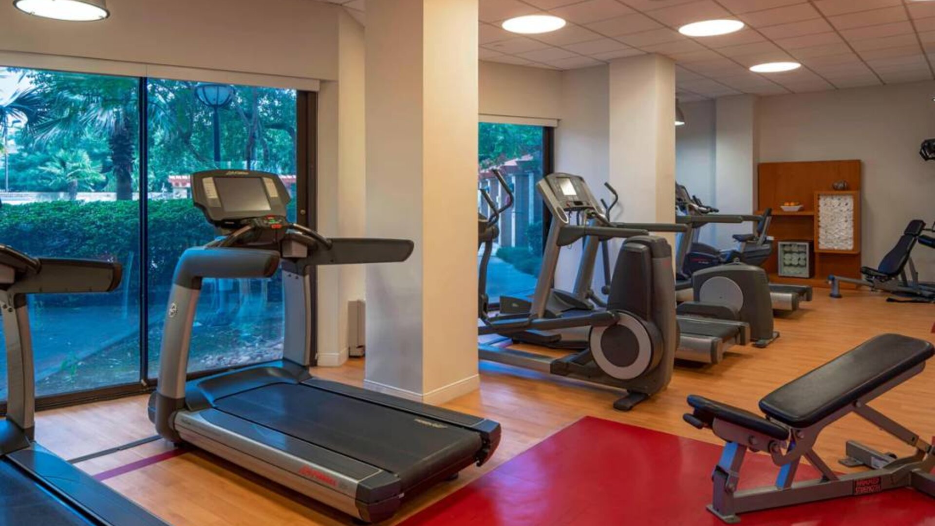 The hotel’s fitness center provides an array of exercise machines for guests.