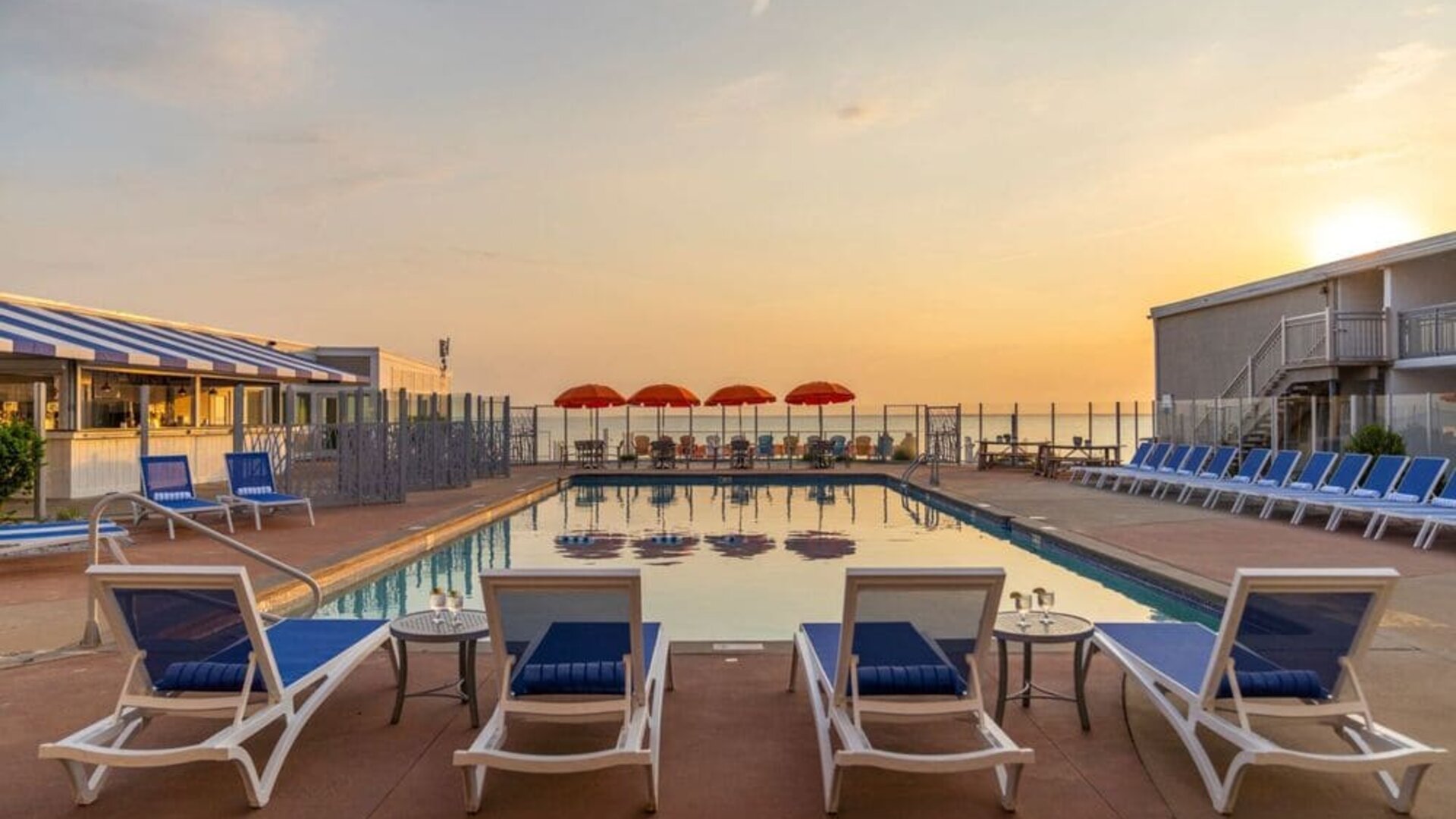 Stunning outdoor pool at sunset at Sea Crest Beach Hotel.