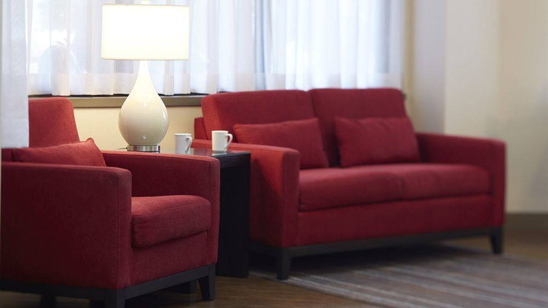 The hotel’s lobby offers comfortable seating for guests to relax.