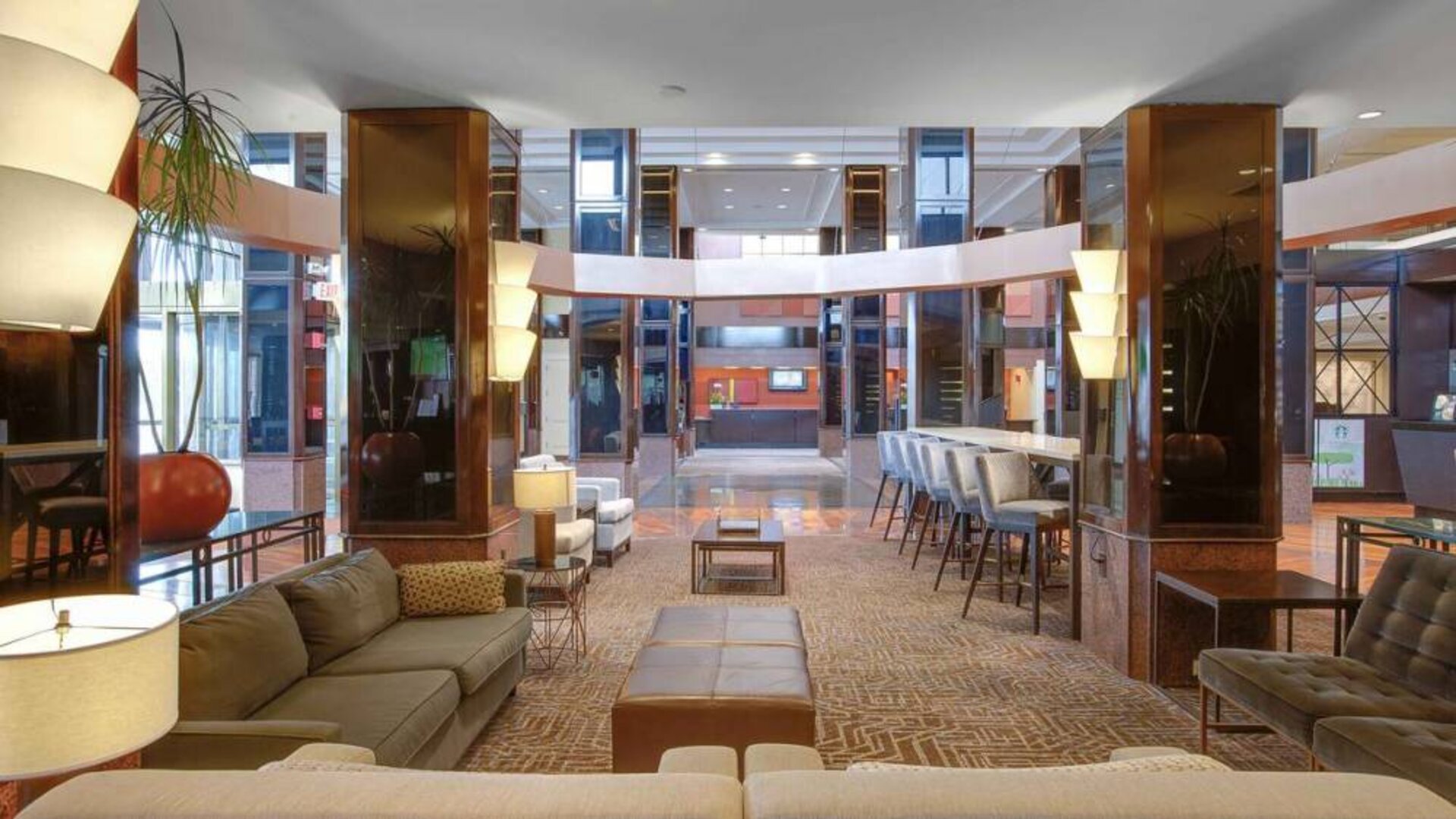 Lobby and coworking lounge at Hilton Newark Airport.