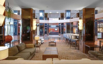 Lobby and coworking lounge at Hilton Newark Airport.