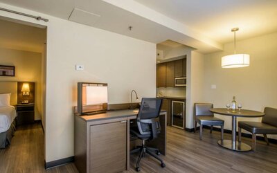 Rodd Miramichi River guest room, featuring in-room workspace with desk and chair.