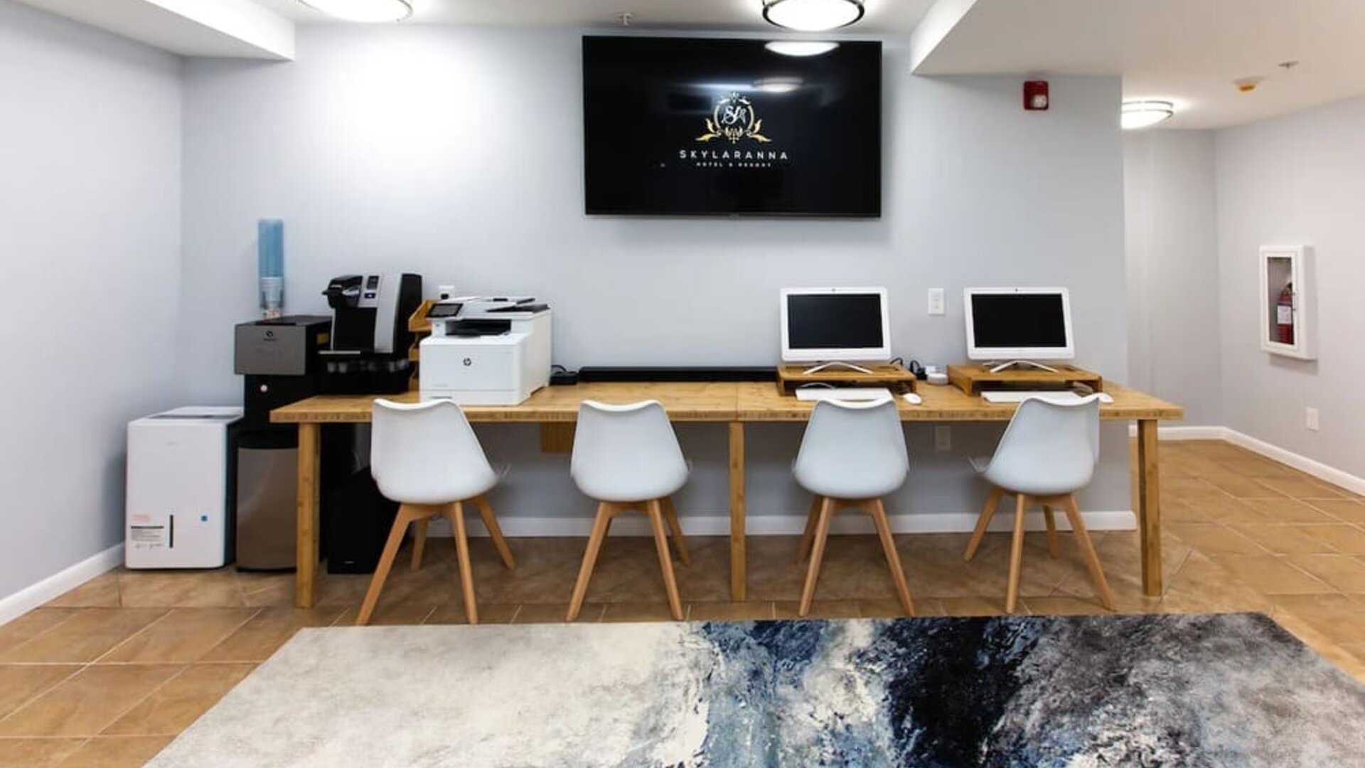 Dedicated business center with PC, internet, and printer at Skylaranna Hotel and Resort.