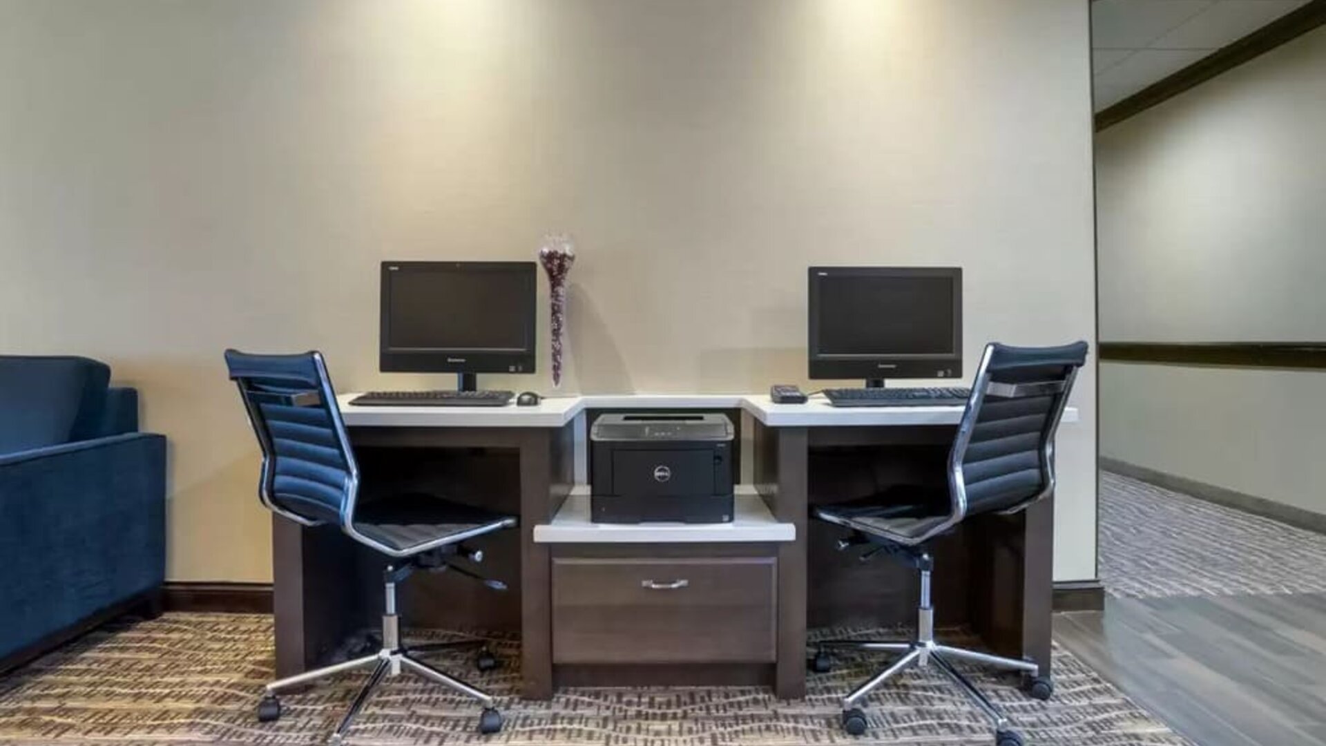 Well-equipped business center with PC, internet, and printer at Comfort Suites Alexandria, LA.