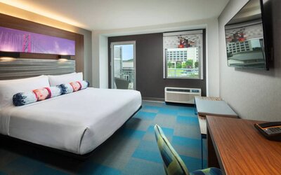 Day use room with balcony and work desk at Aloft SFO.