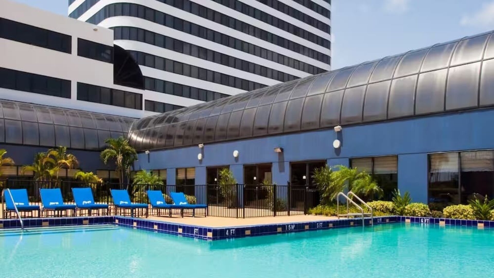 Stunning outdoor pool at Embassy Suites By Hilton West Palm Beach Central.