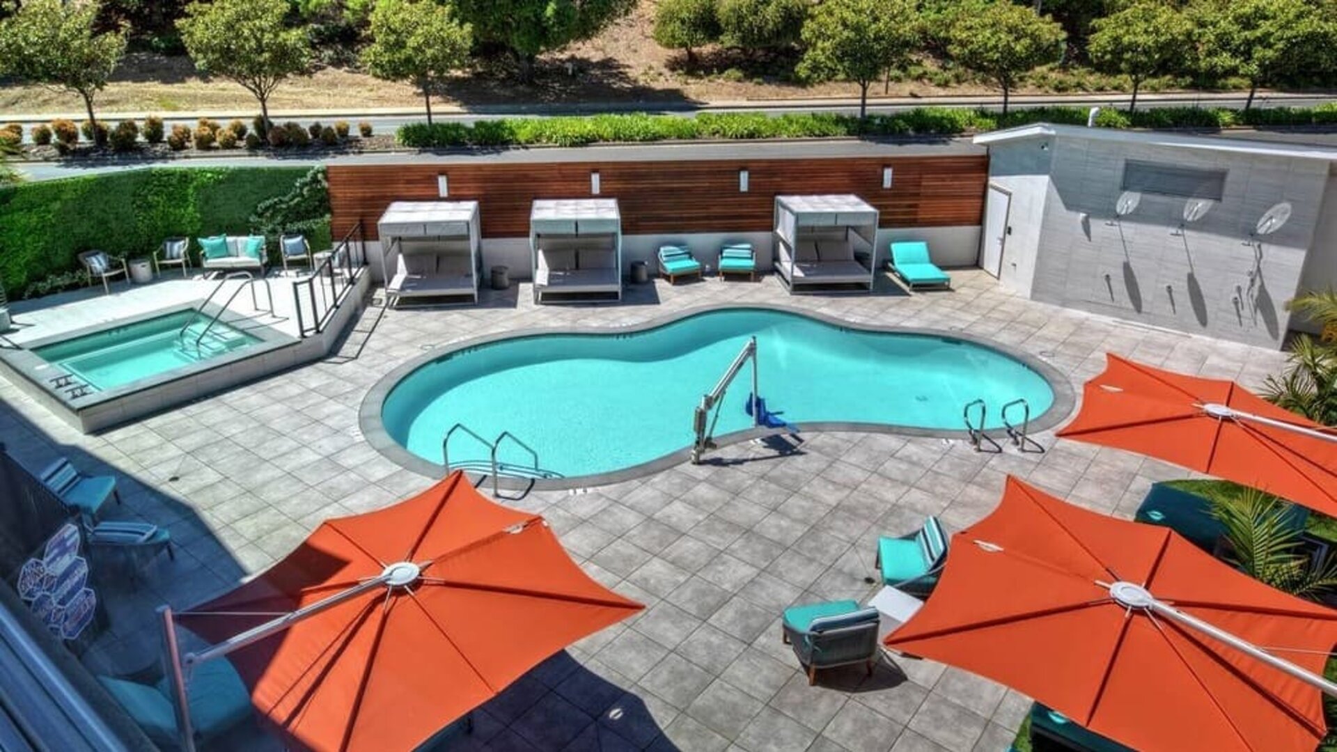 Stunning outdoor pool with sun beds at Hampton Inn Vallejo.