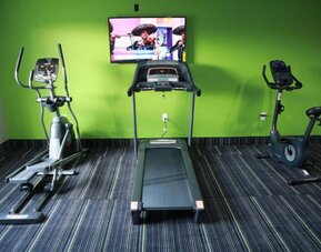 Fitness center available at Home Inn & Suites.