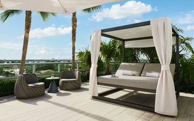 Relaxing cabanas available by the pool at The Altair Hotel Bay Harbor.