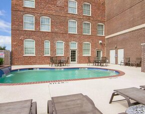 Refreshing outdoor pool at Liberty Hotel Cleburne, An Ascend Hotel Collection Member.