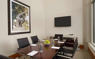 Professional and bright-lit meeting room ideal for all business meetings at Homewood Suites by Hilton University City.