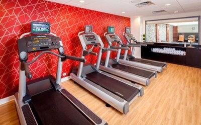 Well equipped fitness center at Courtyard By Marriott Boston Brookline.