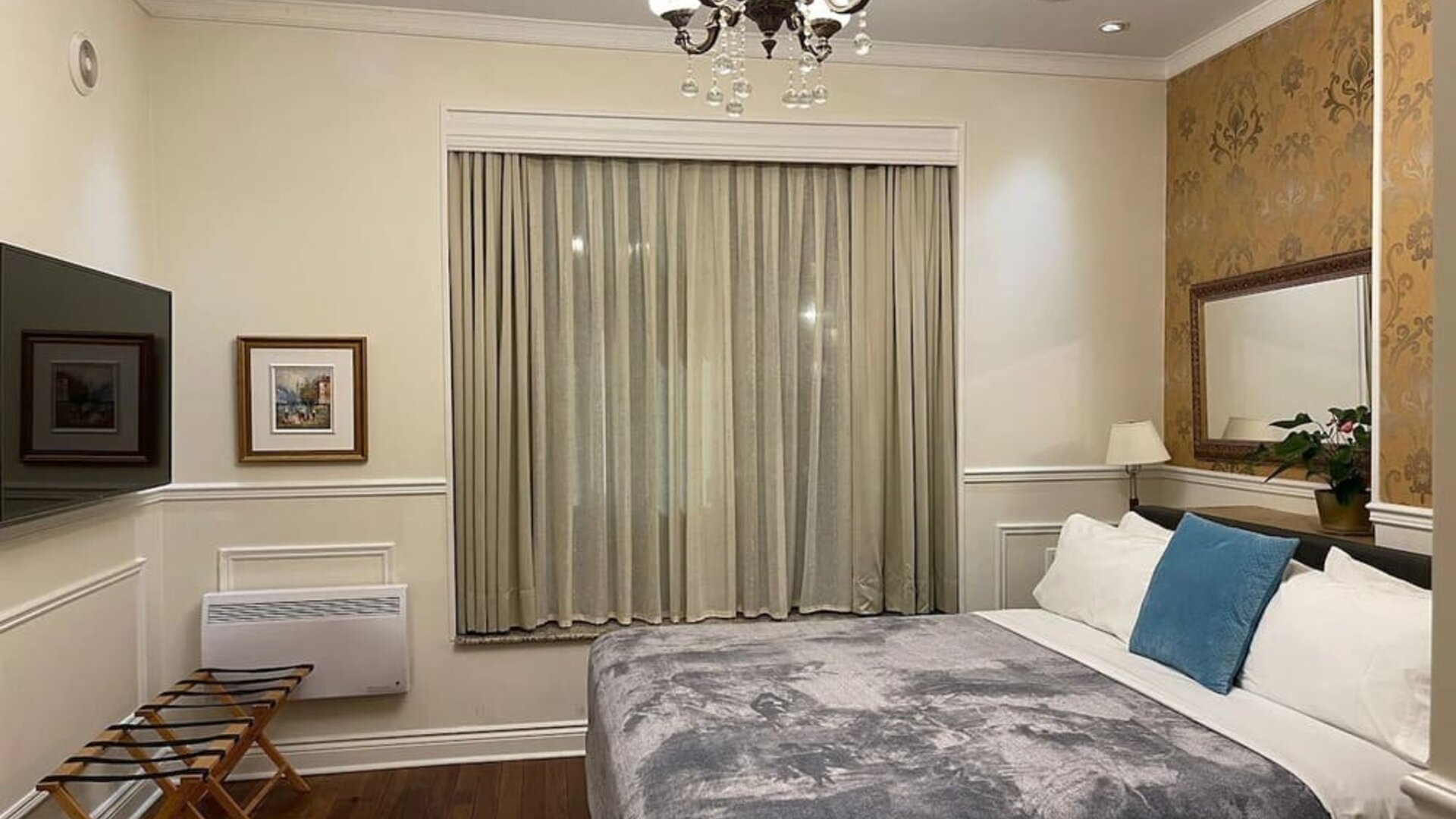 Day use room with TV and air conditioning at Parc Suites Hotel.