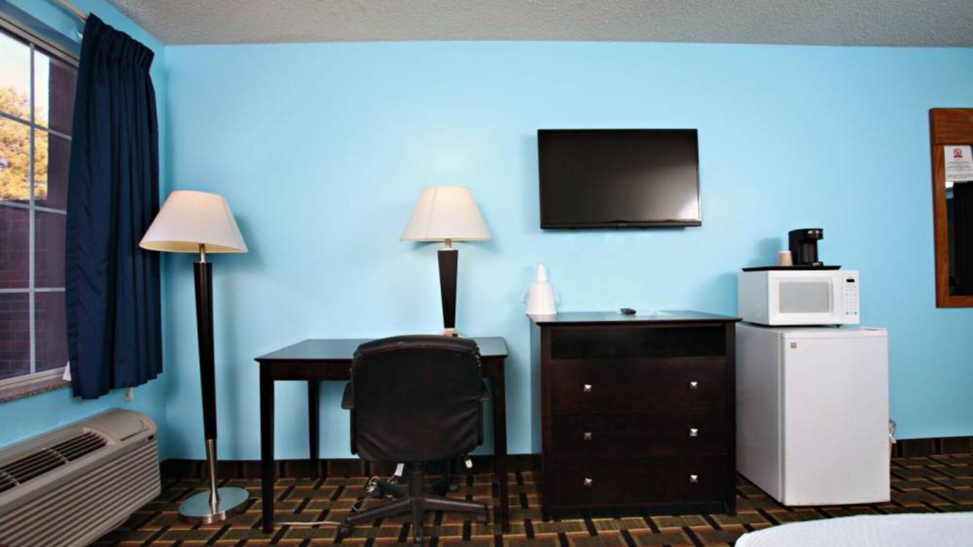 Day use room amenities at Coratel Inn & Suites By Jasper Newton.