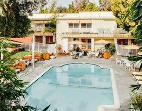 Refreshing outdoor pool at Wild Palms Hotel.