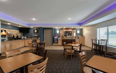Dining area at AmericInn By Wyndham Sioux Falls North.