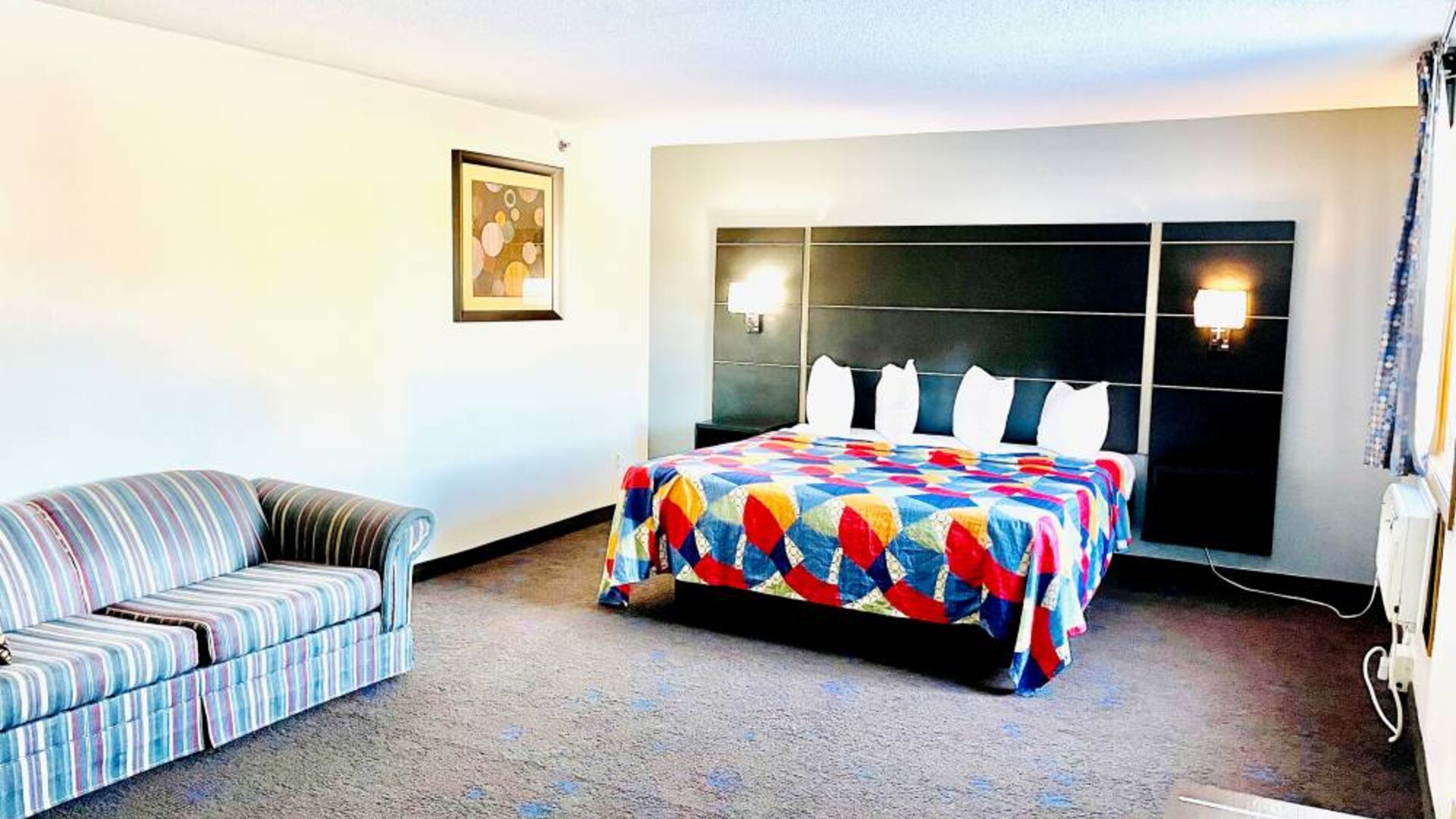 Spacious day use room with natural light at Coratel Inn & Suites By Jasper Northfield.