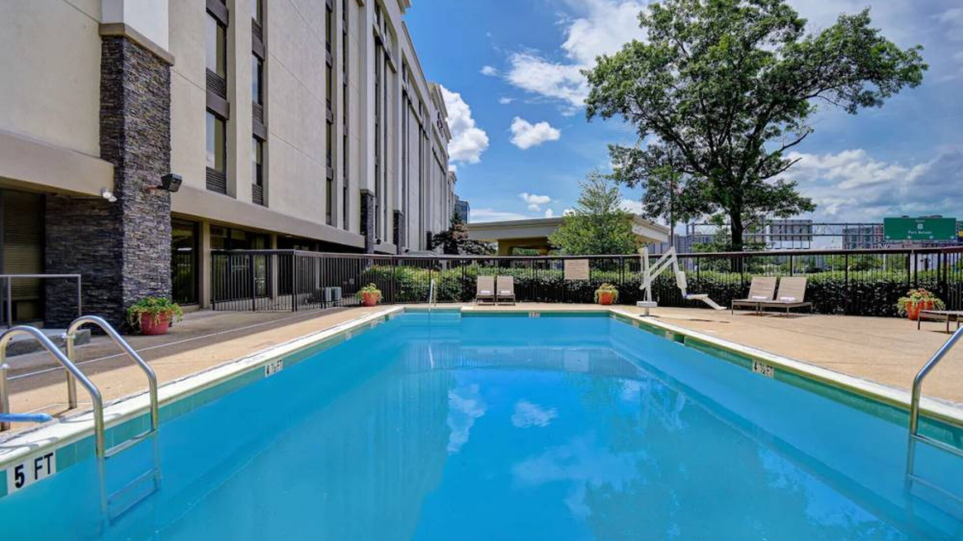 Refreshing outdoor pool at Hampton Inn & Suites Alexandria.