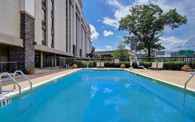 Refreshing outdoor pool at Hampton Inn & Suites Alexandria.