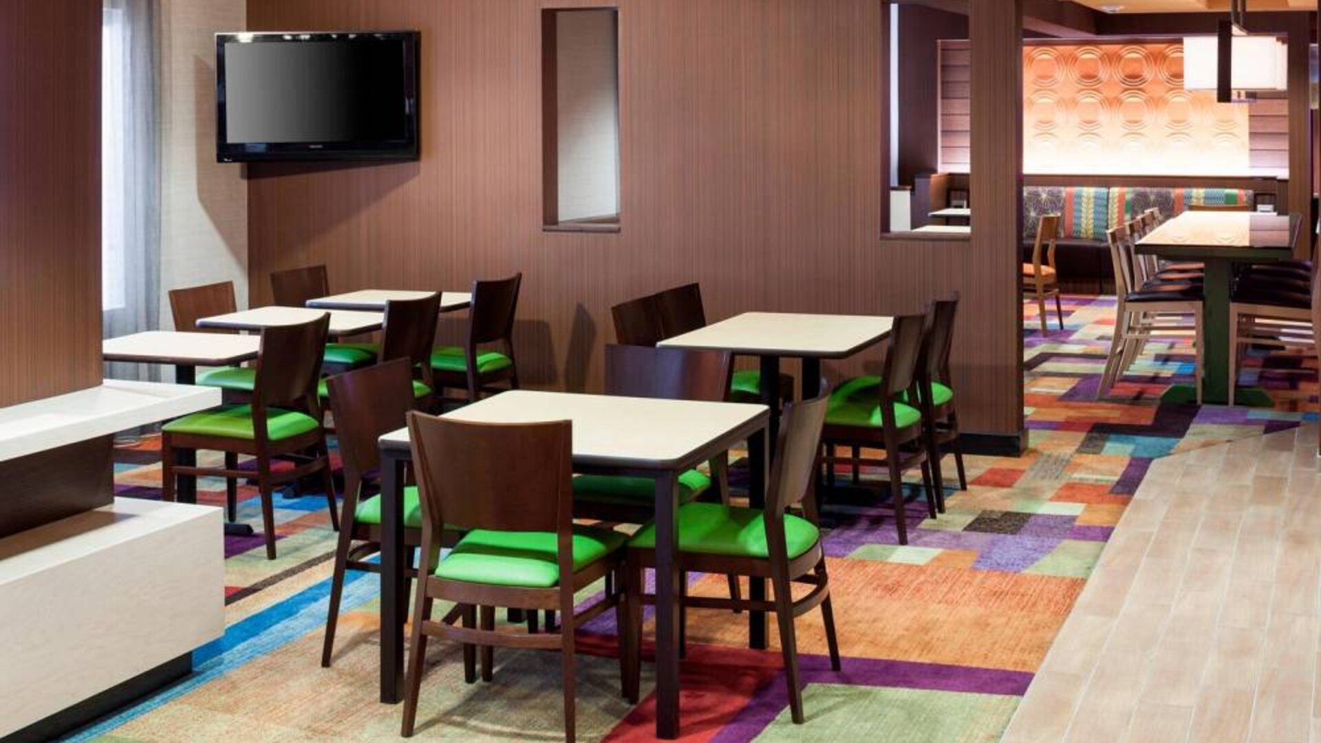 Dining area perfect for coworking at Fairfield Inn By Marriott Santa Clarita Valencia.
