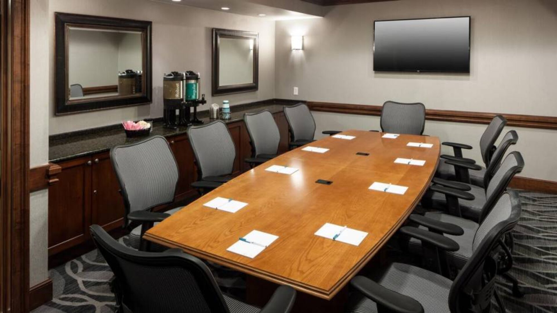 Professional meeting room at Homewood Suites By Hilton Denton.
