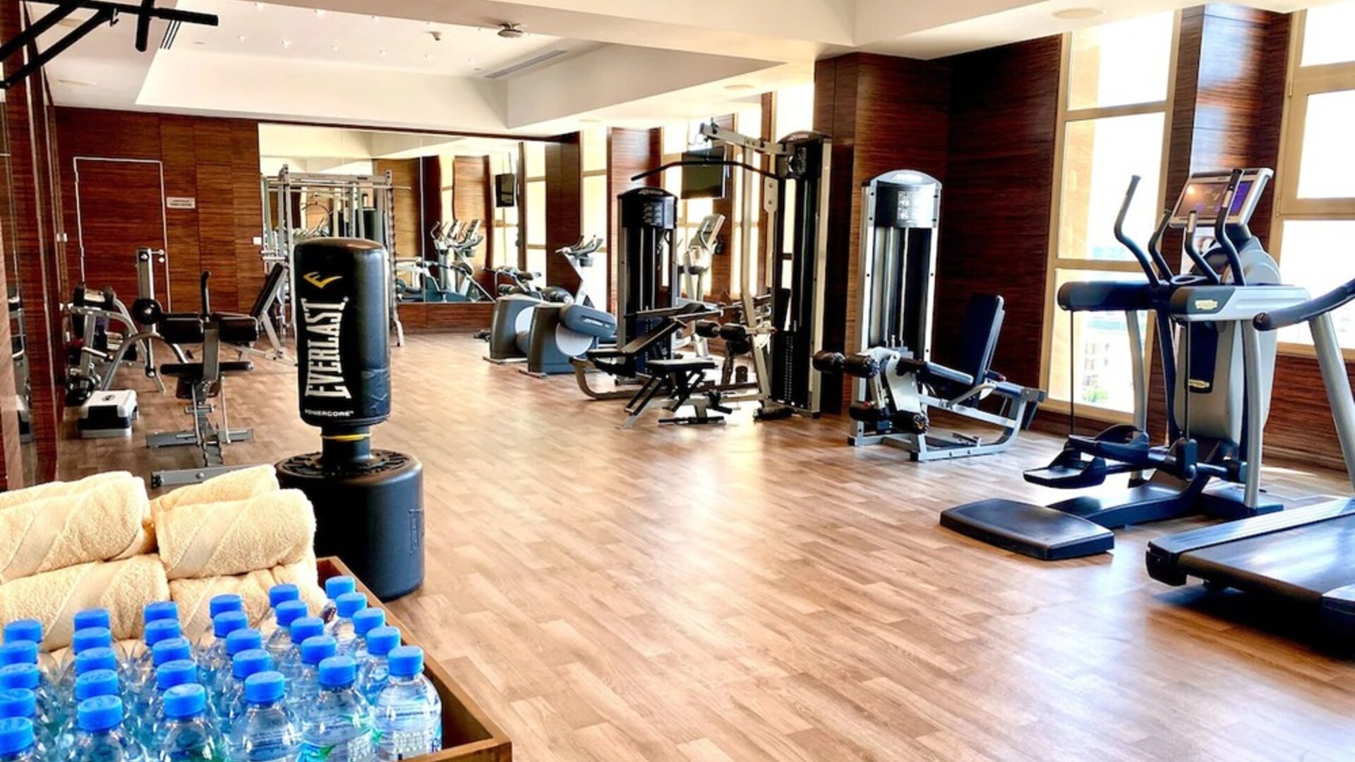 Equipped fitness center at Millennium Hotel Doha.