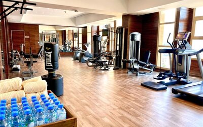Equipped fitness center at Millennium Hotel Doha.