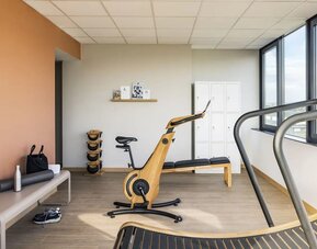 Fitness center at OKKO Hotels Nice Aéroport.