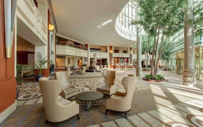 Lounge, lobby, and coworking space at Hilton Boston Logan Airport.