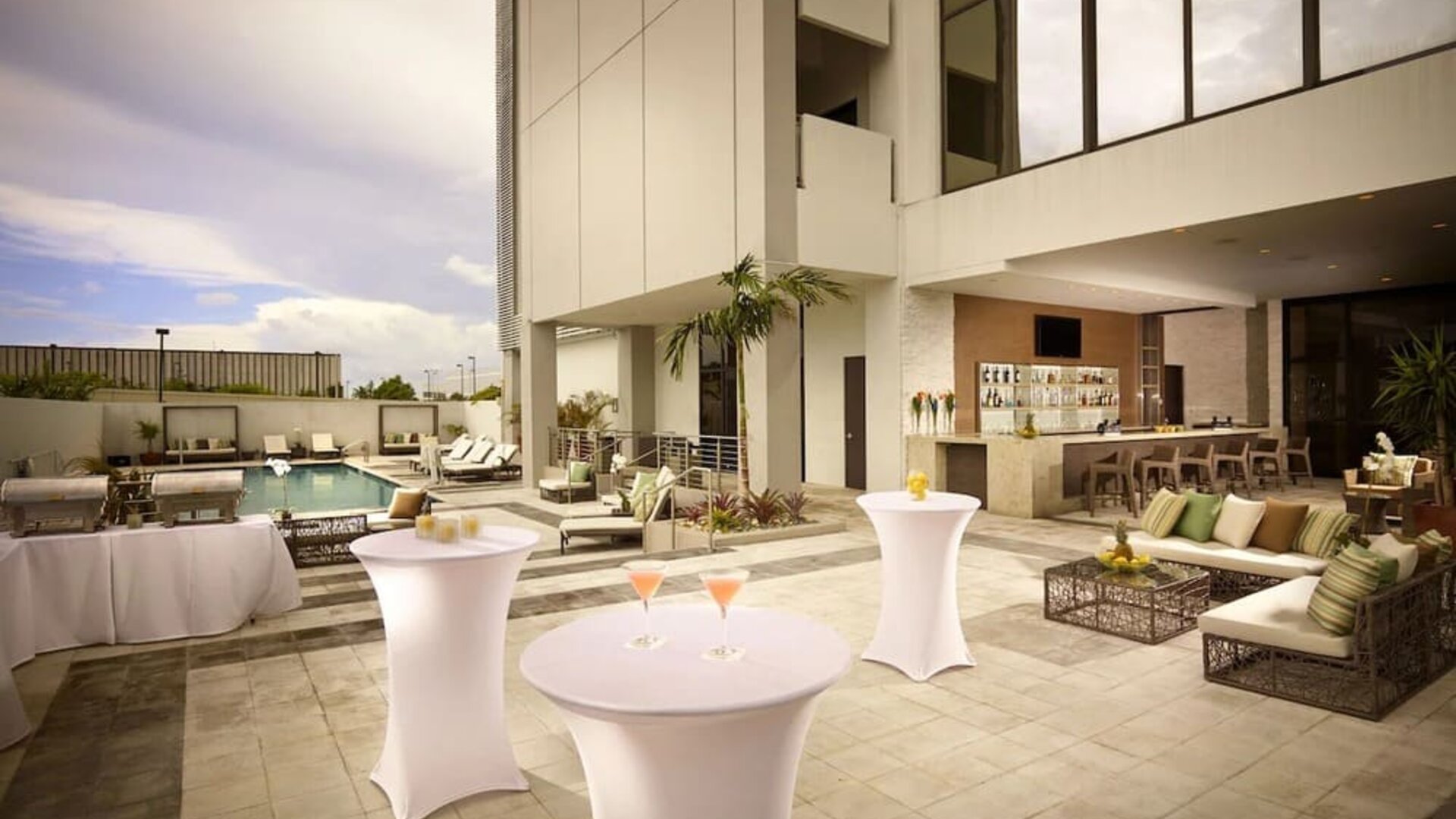 Seats available beside pool and bar at EB Hotel Miami.