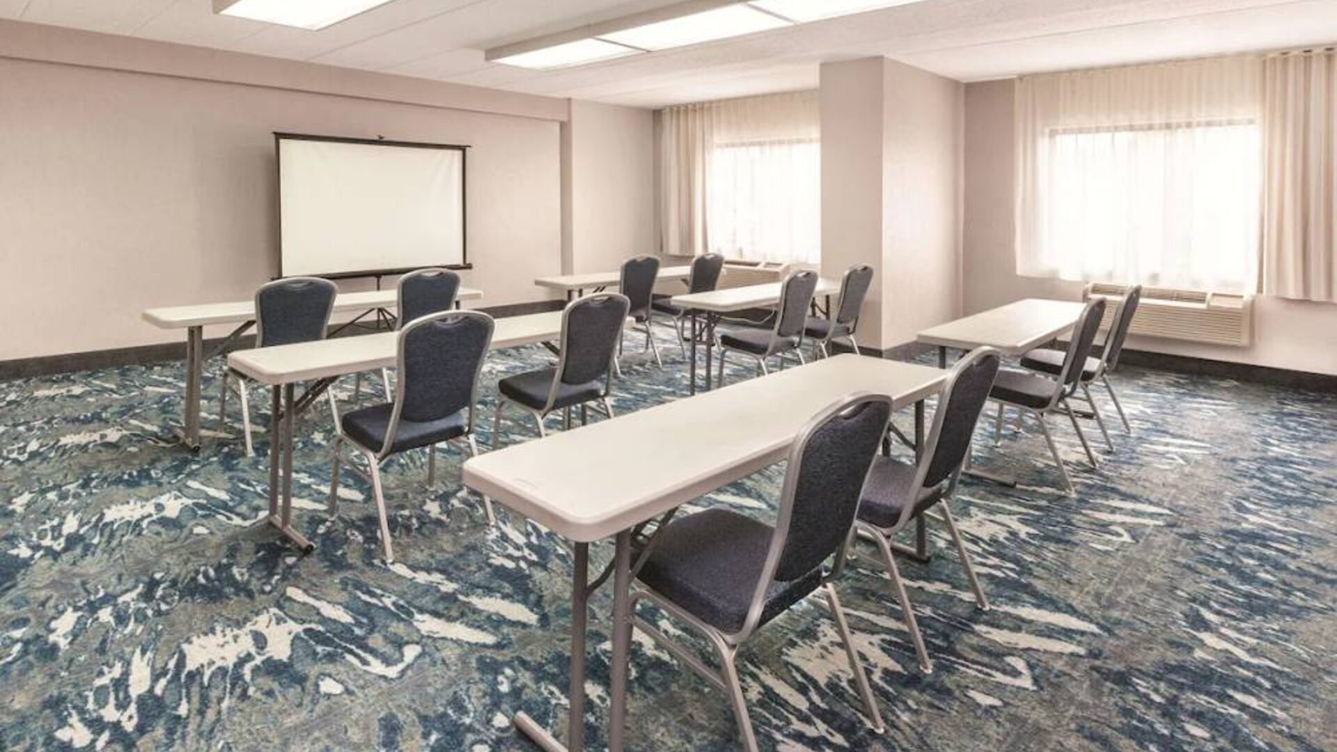 Spacious meeting room at La Quinta Inn & Suites By Wyndham Philadelphia Airport.