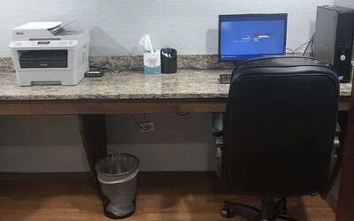 Dedicated business center with PC, internet, and printer at Radisson Hotel Schaumburg.