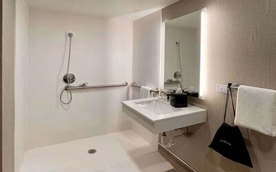 Guest bathroom with shower at Sleep Inn Oakbrook Terrace.