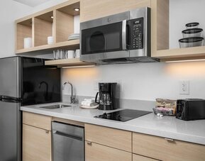 In-room kitchen at TownePlace Suites Nashville Midtown.