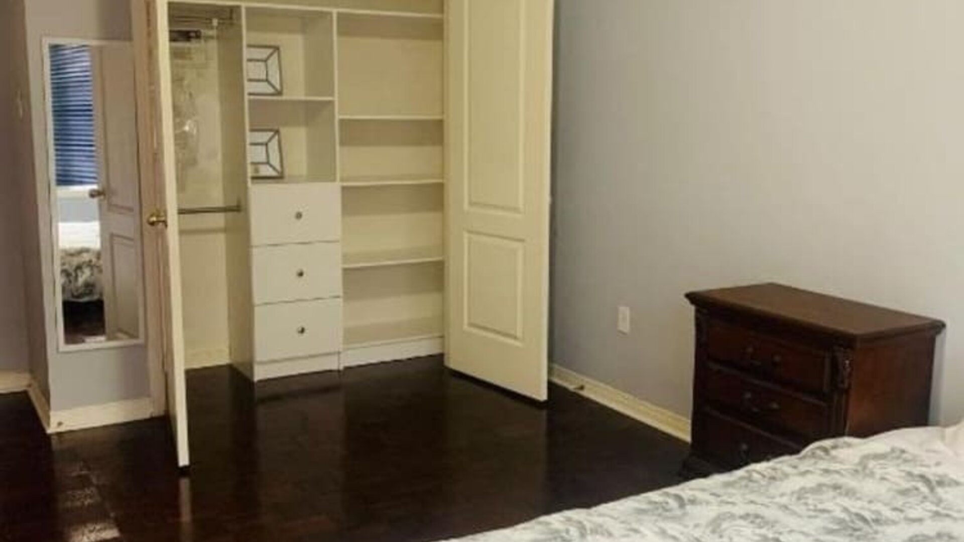 King bed with closet space at Home Stay Canada.