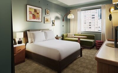 Deluxe king room with natural light at Romer Hell's Kitchen.