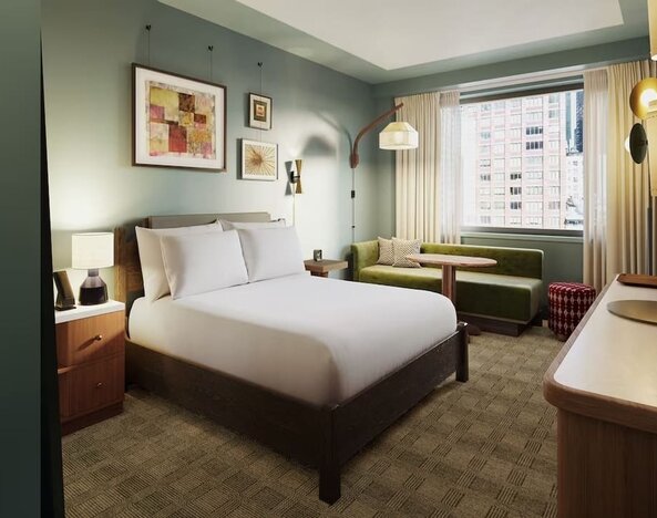 Deluxe king room with natural light at Romer Hell's Kitchen.