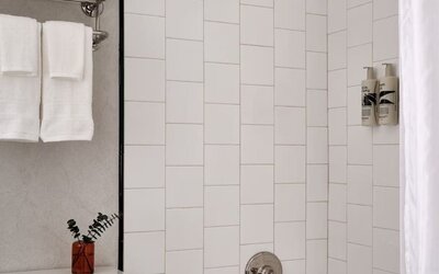 Private guest bathroom with shower at Romer Hell's Kitchen.