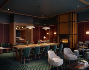 Lobby lounge area and workspace at Romer Hell's Kitchen.