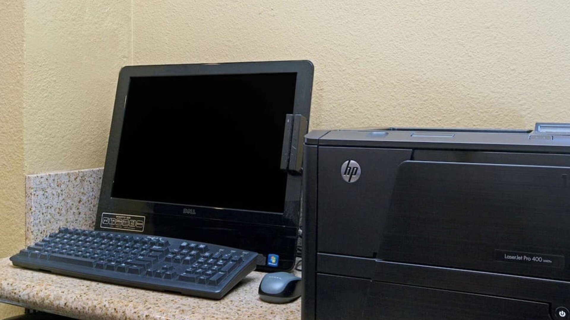 Business center with computer and printer at Travelodge LAX By Wyndham.