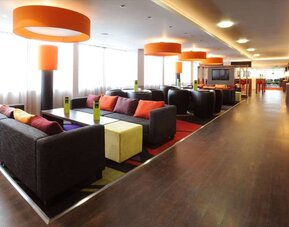 Lobby and coworking lounge at Hampton By Hilton Birmingham Broad Street.
