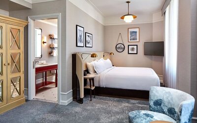 Spacious king room with TV and bathroom at The Citizen Hotel, Autograph Collection.