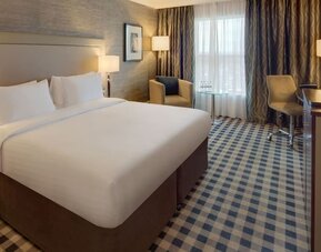 Bright and spacious day use room with lounge area at DoubleTree By Hilton Newcastle International Airport.