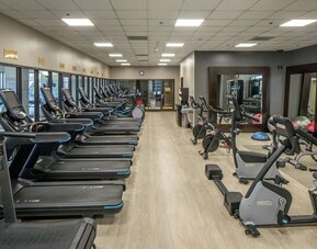 Fully equipped fitness center at Hilton Minneapolis.
