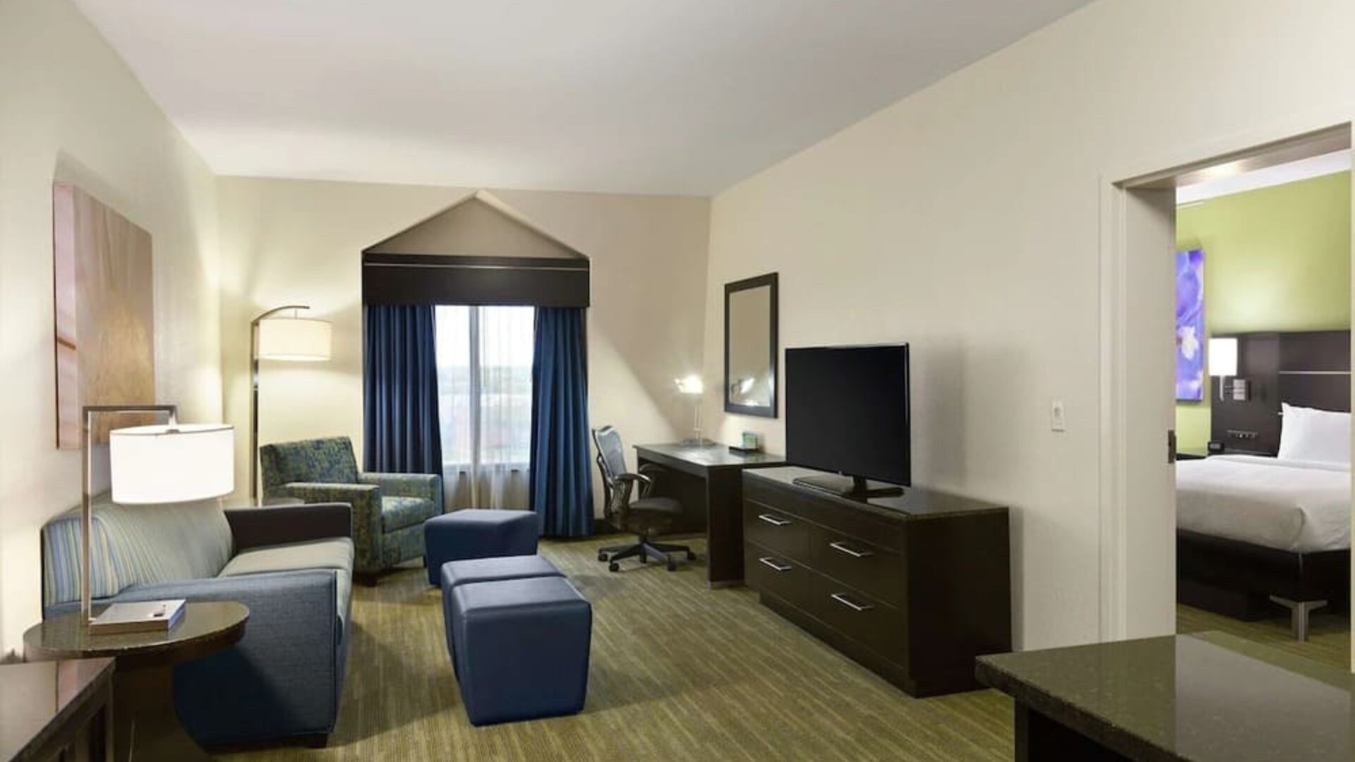 Day use suite with living room and workspace at Hilton Garden Inn Houston NW/Willowbrook.