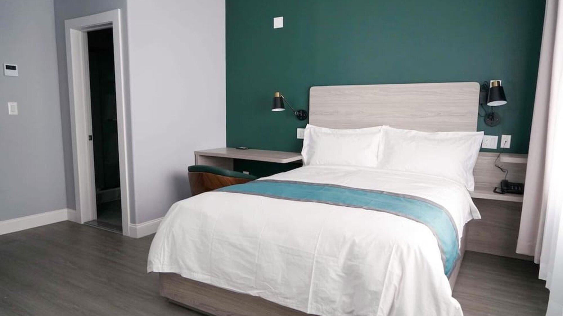 King bed with natural light. 